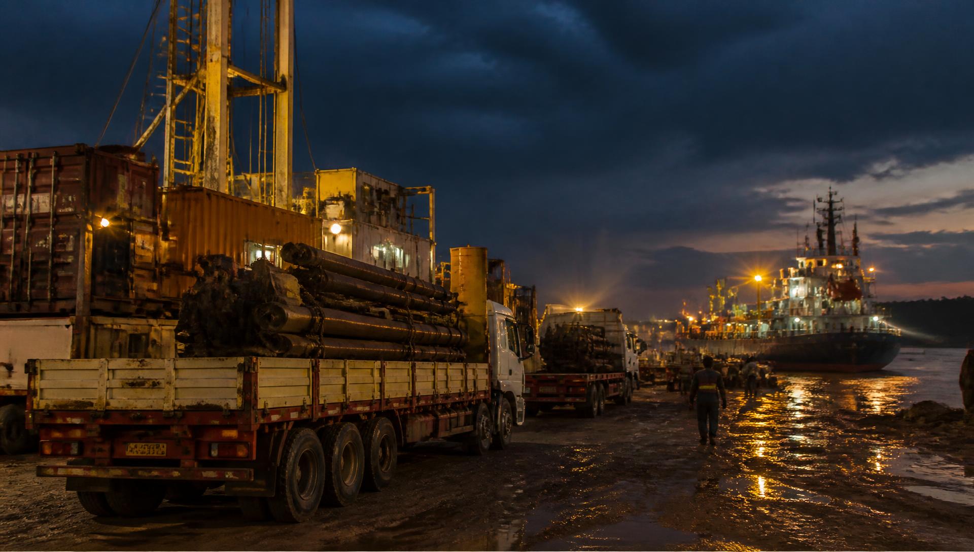 LeSam Haven Logistics yard with trucks and cargo vessel